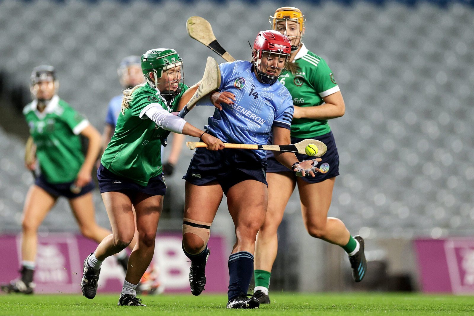 Camogie players contest possession at Croke Park with an Illuminous sliotar